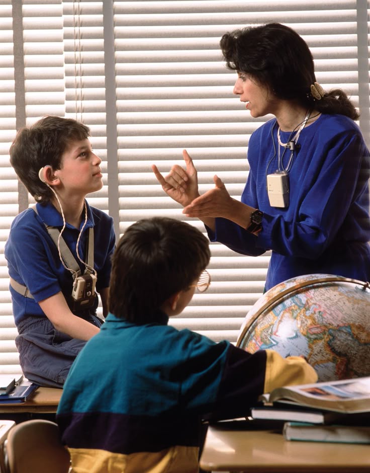 Teacher demonstrating sign language